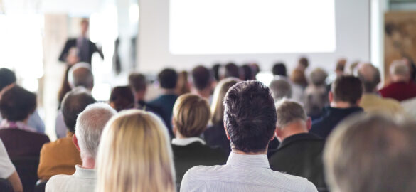 Speaker,Giving,A,Talk,At,Business,Meeting.,Audience,In,The DBDH workshops and conferences