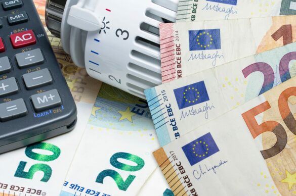 Heating,Thermostat,And,Calculator,On,Euro,Money,Banknotes.,Concept,Of