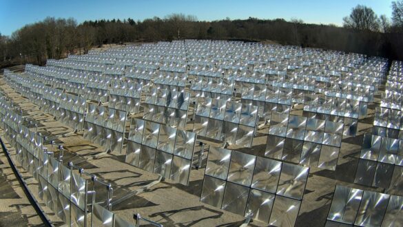 Heliac solar panels for high-temperature district heating