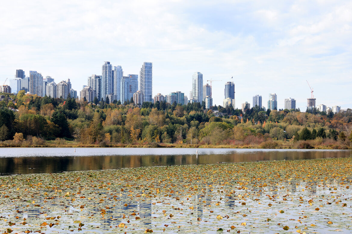 Burnaby, Skyline of MetroVancouver, seen from Deer Lake, British Columbia, Canada