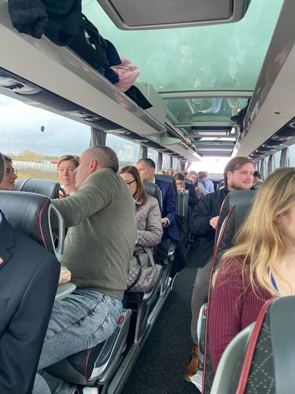 Delegation in bus on Track 1