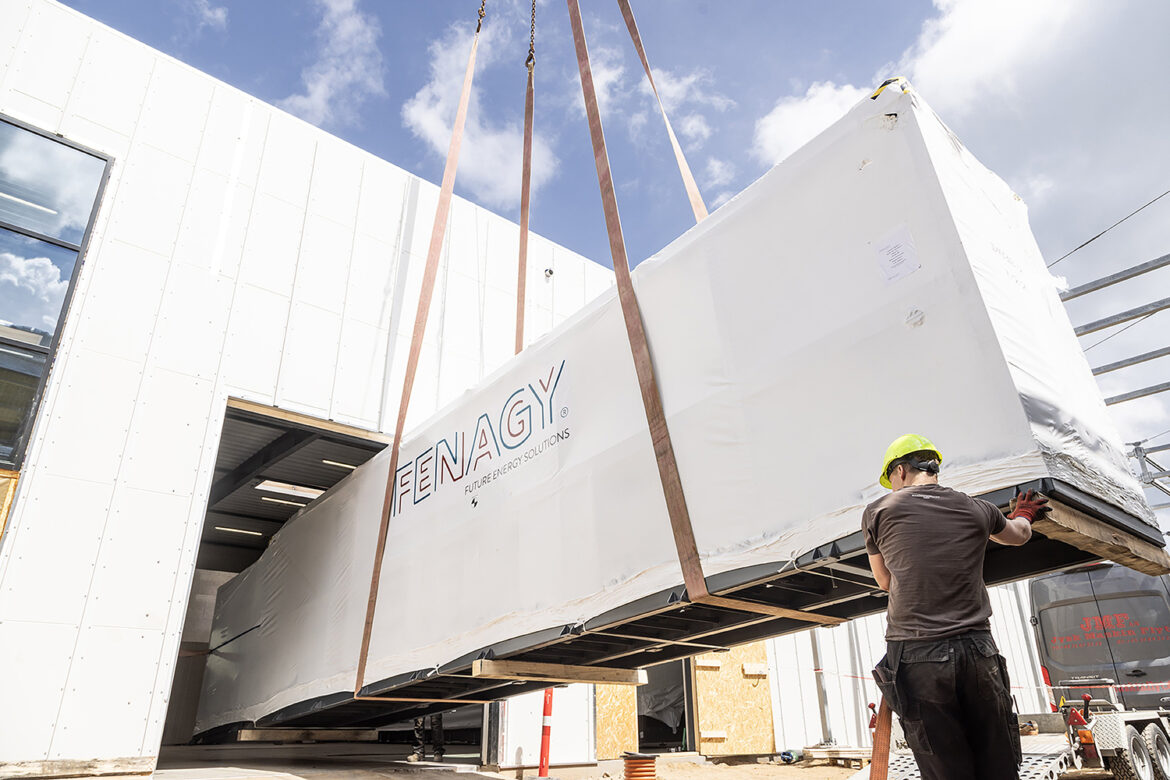 One of six heat pumps being hoisted into place in Billund. Photo by Fenagy